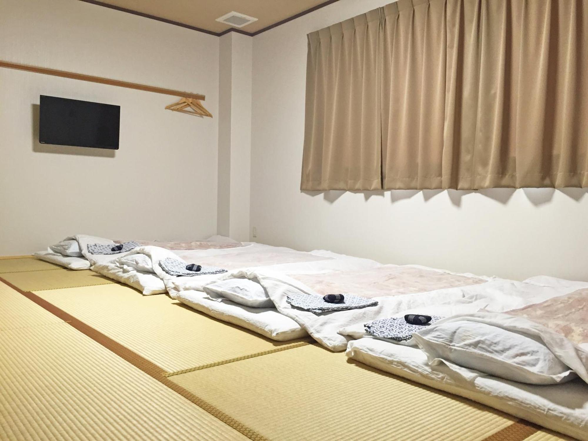 Hotel Onsenminshuku Kosakaya Nachikatsuura Zimmer foto