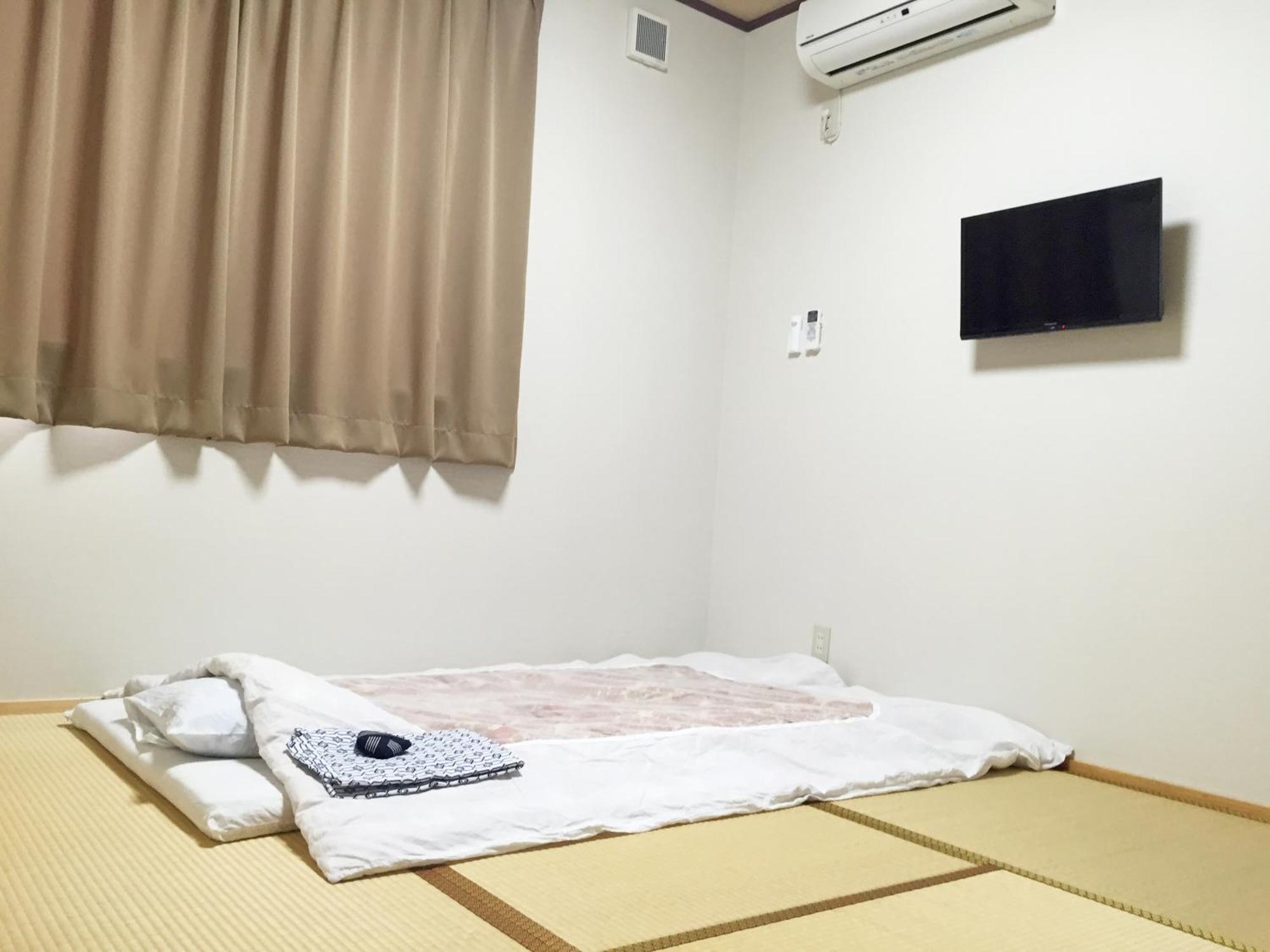 Hotel Onsenminshuku Kosakaya Nachikatsuura Zimmer foto